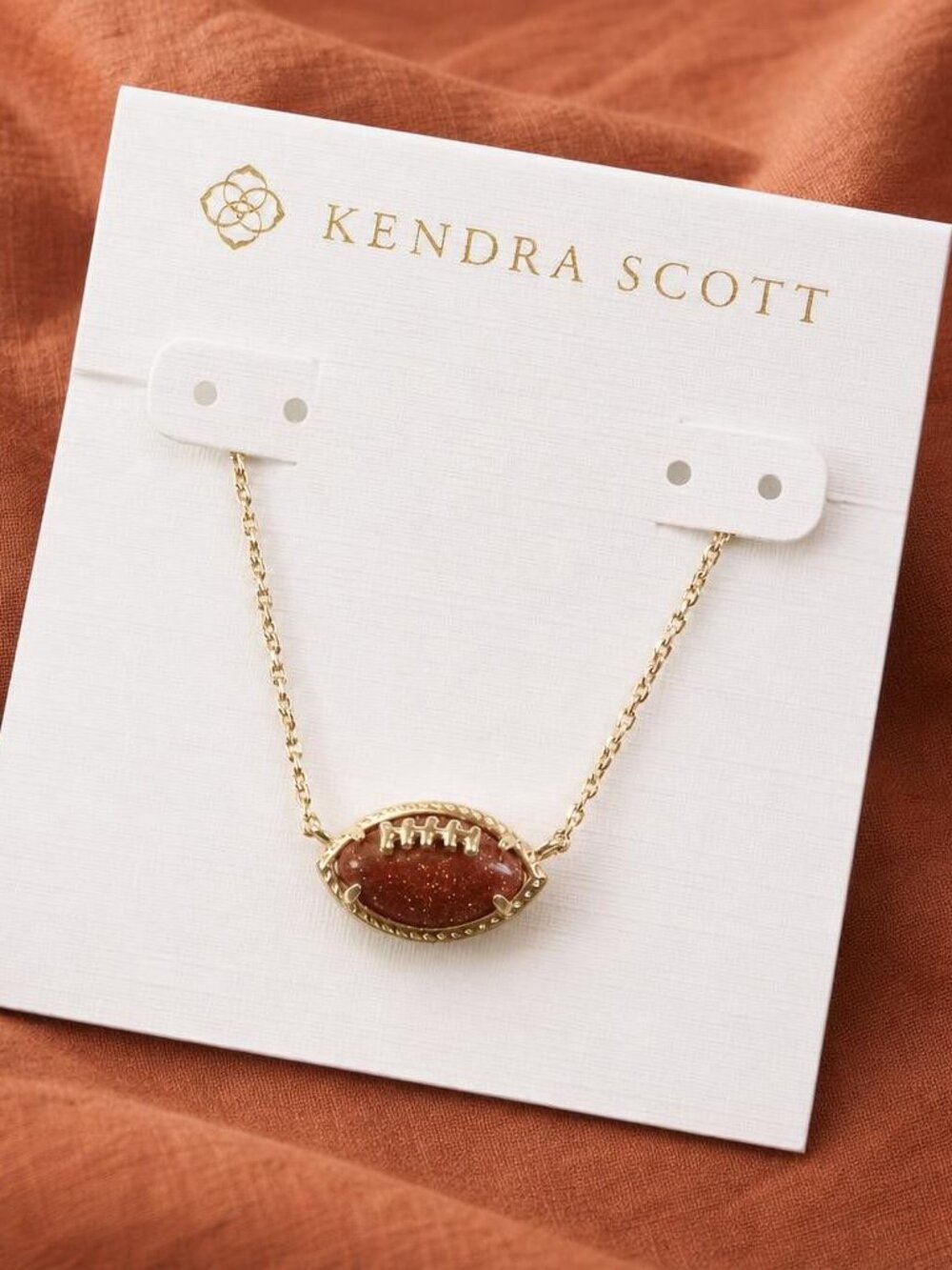 kendra scott football gold orange goldstone pendant necklace.